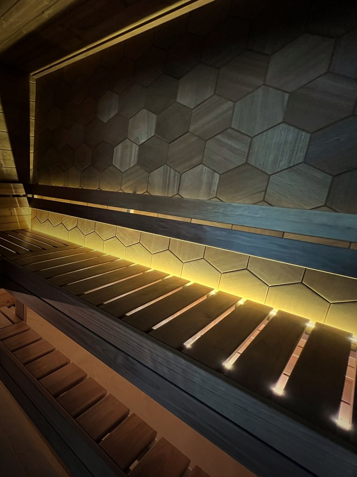 Moodem hexagon wall and lit bench in thermowood